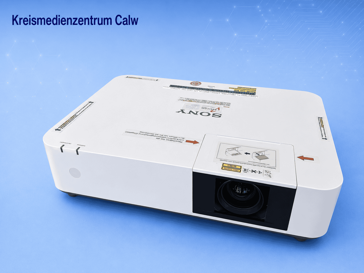 Laserprojektor Sony VPL-PHZ10 mit 5000 ANSI Lumen auf blauer Hintergrund.